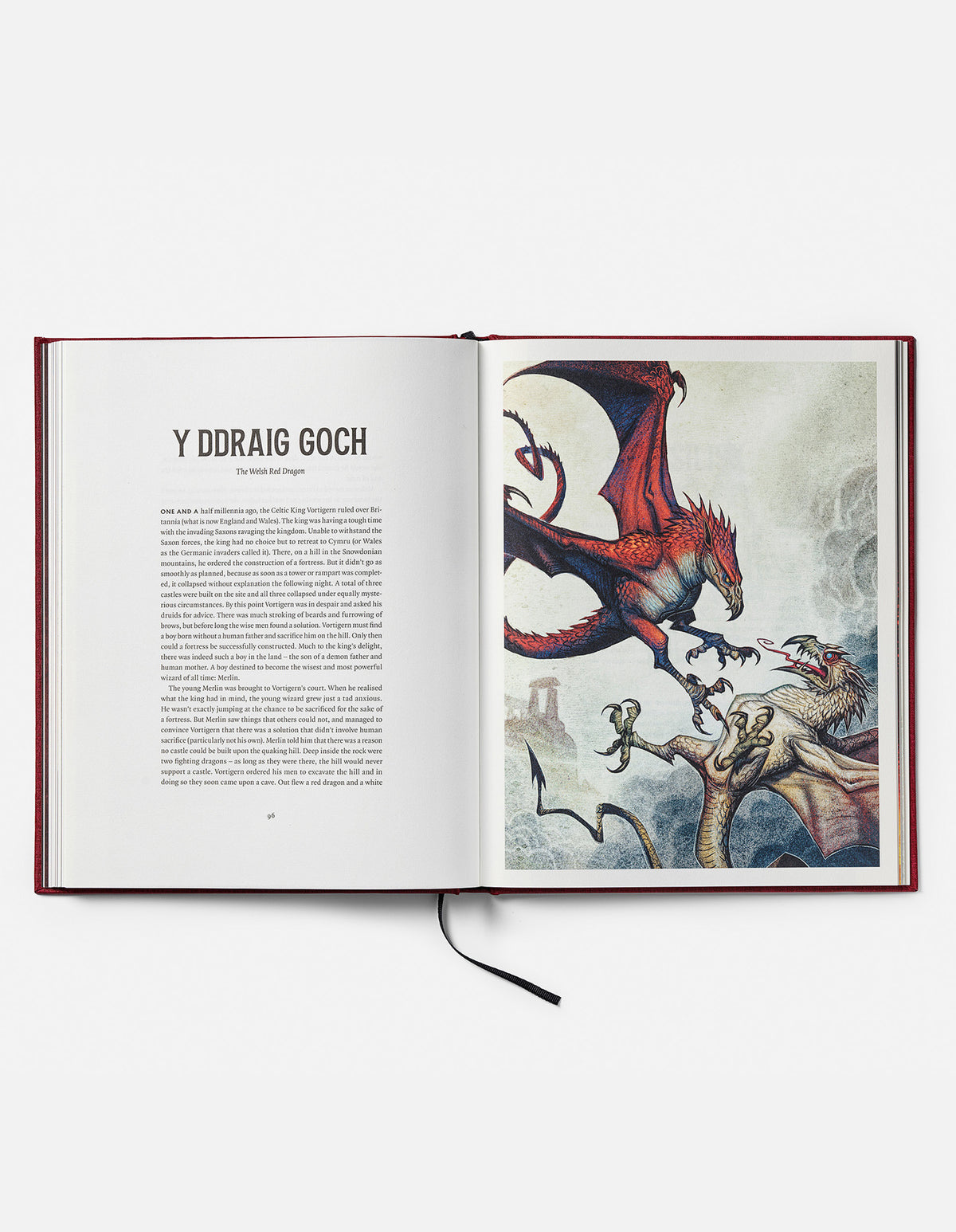 Open Dragons book at the Y Ddraig Goch chapter, showing a red dragon fighting a white dragon.